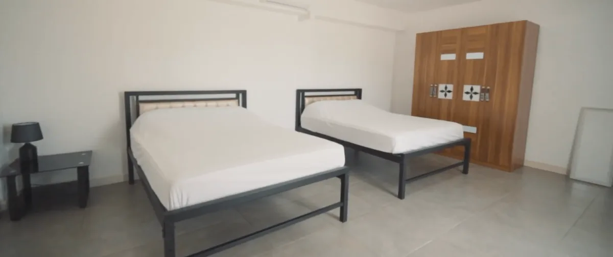 Slaapkamer met twee bedden